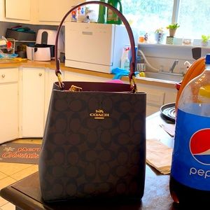 Brown with dark red trim smaller purse